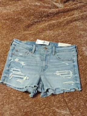 American Eagle Light Wash Distressed Next Level Stretch Shorties